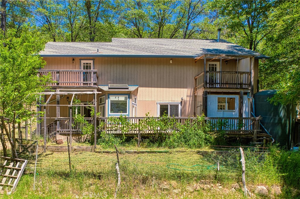 11575 Loch Lomond Road Middletown, CA 95461 - Photo 35 of 38 a front view of a house with a yard