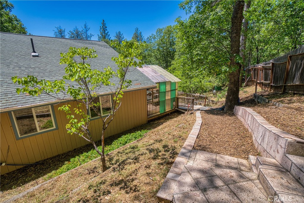 11575 Loch Lomond Road Middletown, CA 95461 - Photo 6 of 38 a view of a backyard with sitting area