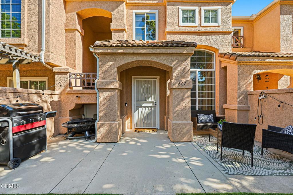 a view of a building with sitting area
