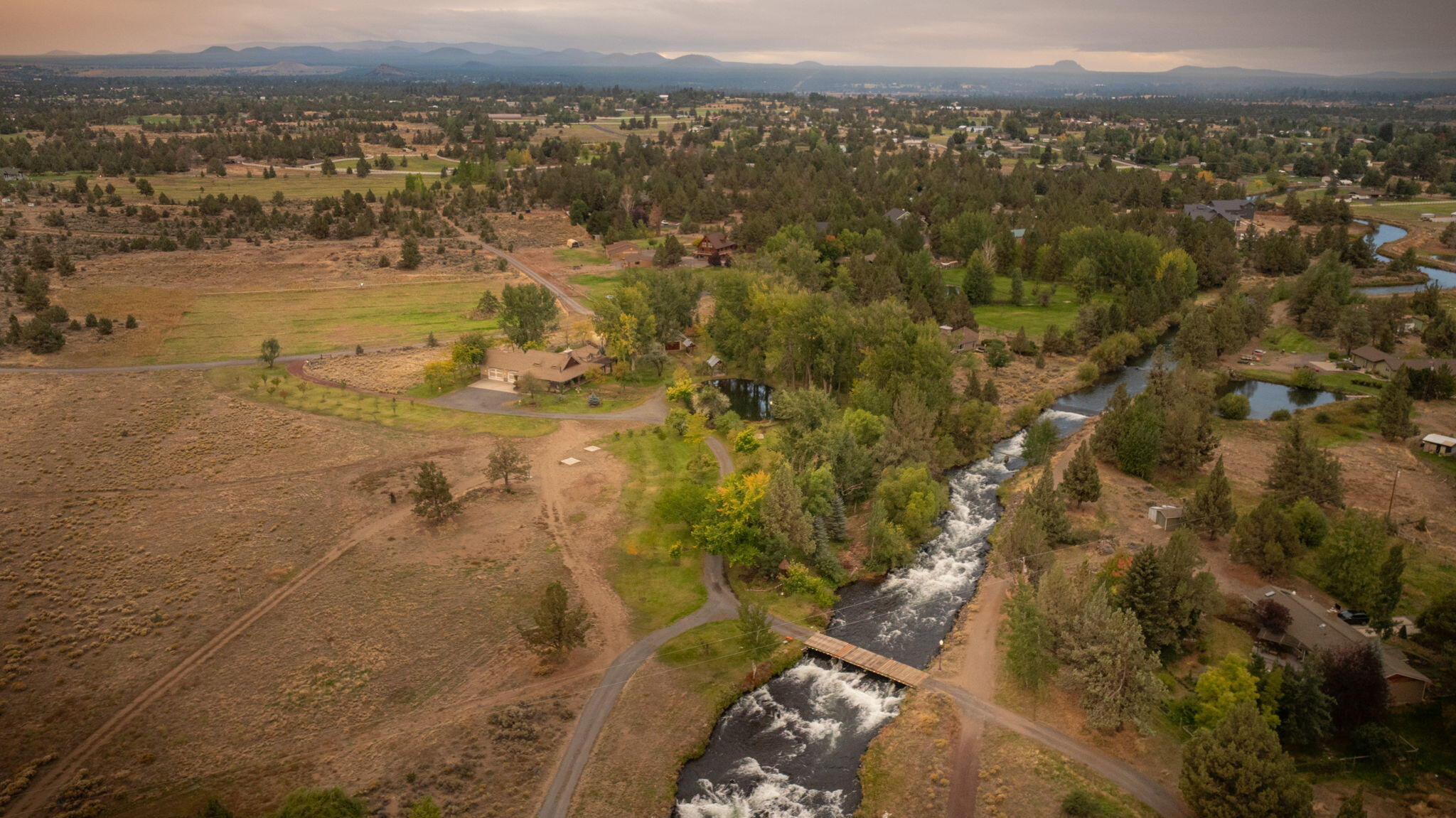 21925 Bear Creek Road Bend, OR 97702 - Photo 101 of 104 Arial photo of the farm and the canal