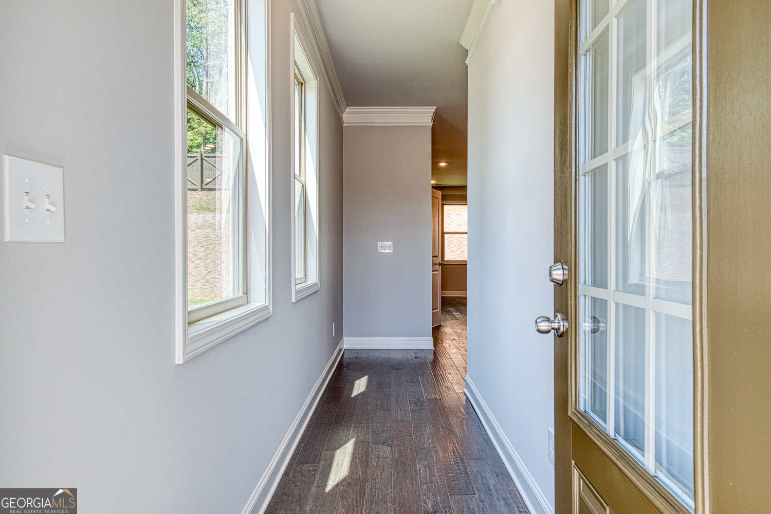 181 Depot Landing Road, Unit 28A Auburn, GA 30011 - Photo 2 of 29 a view of a hallway with wooden floor and closet