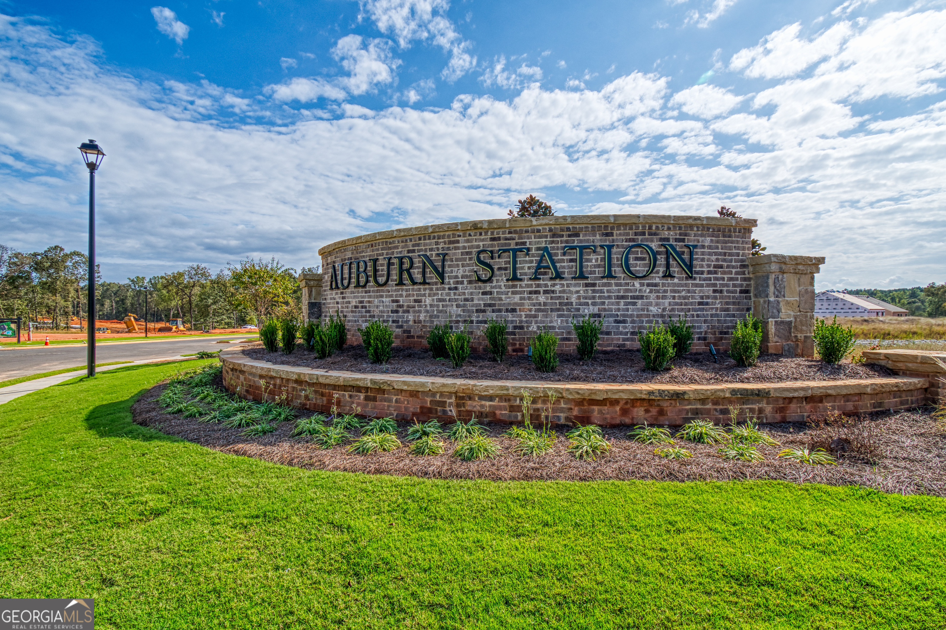 181 Depot Landing Road, Unit 28A Auburn, GA 30011 - Photo 27 of 29 a view of a garden with a building in the background
