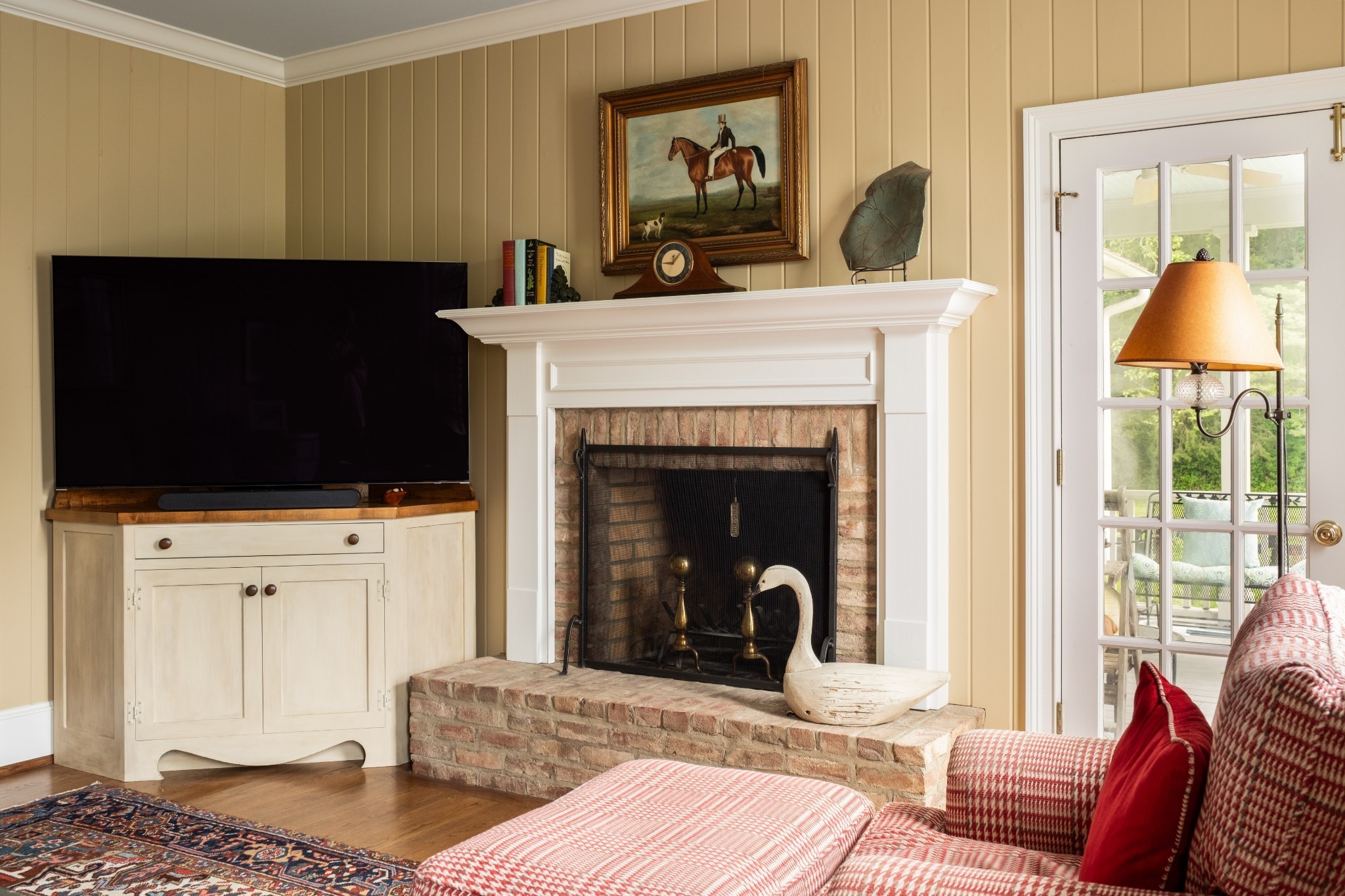 5620 Leipers Creek Road Franklin, TN 37064 - Photo 47 of 74 a living room with furniture a flat screen tv and a fireplace
