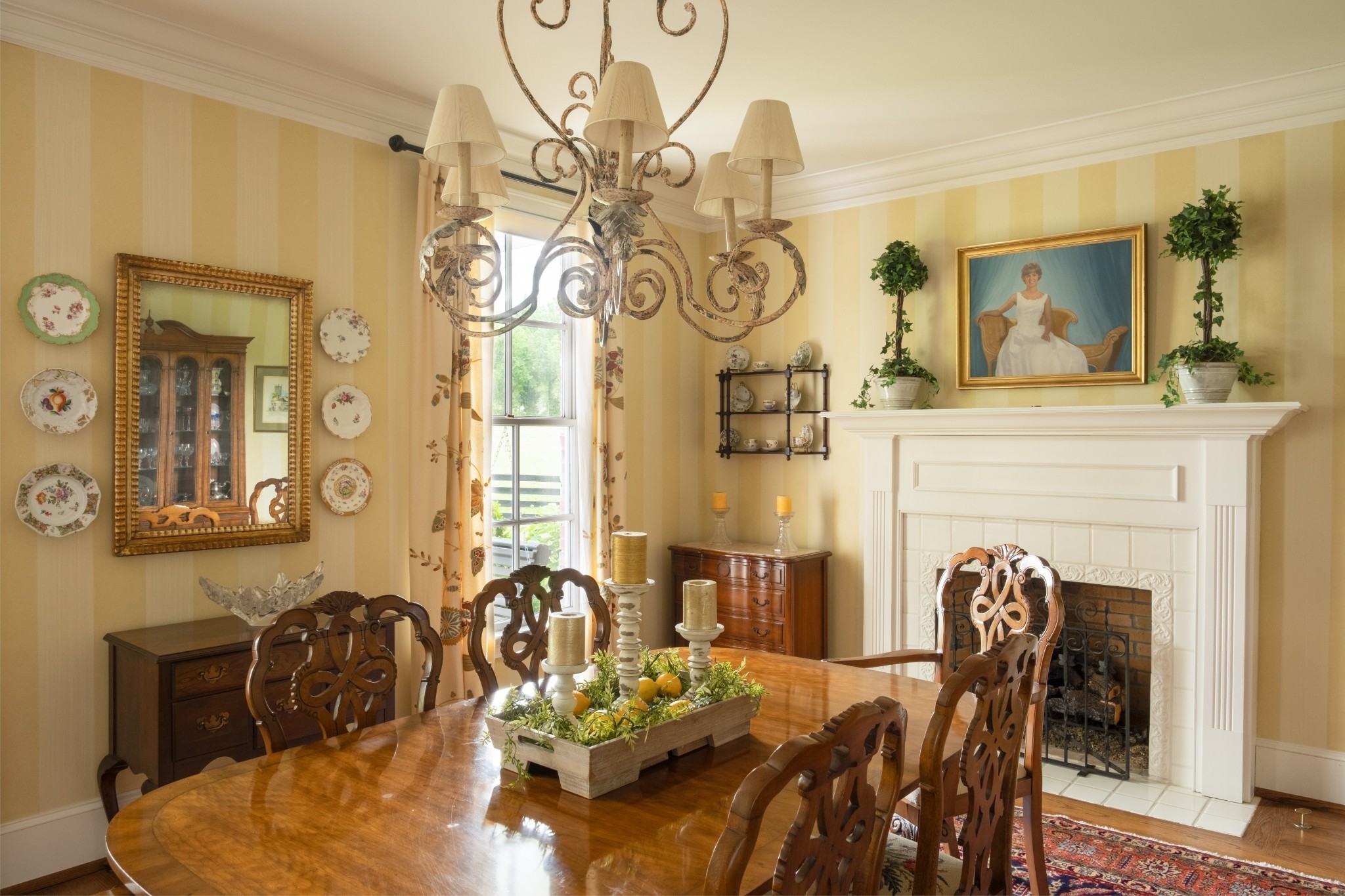 5620 Leipers Creek Road Franklin, TN 37064 - Photo 48 of 74 a view of a dining room with furniture a chandelier and wooden floor