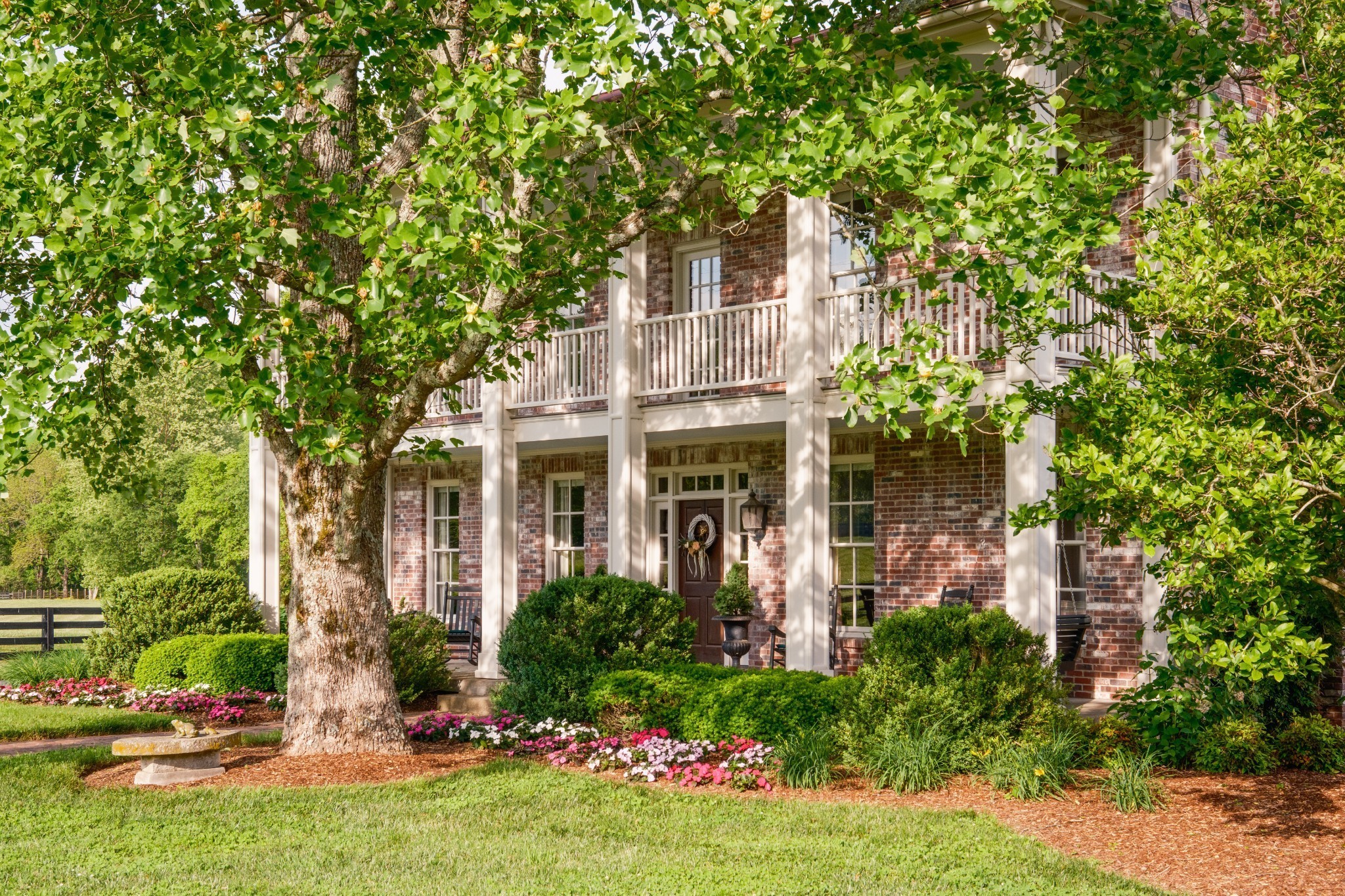 5620 Leipers Creek Road Franklin, TN 37064 - Photo 6 of 74 a front view of a house with garden