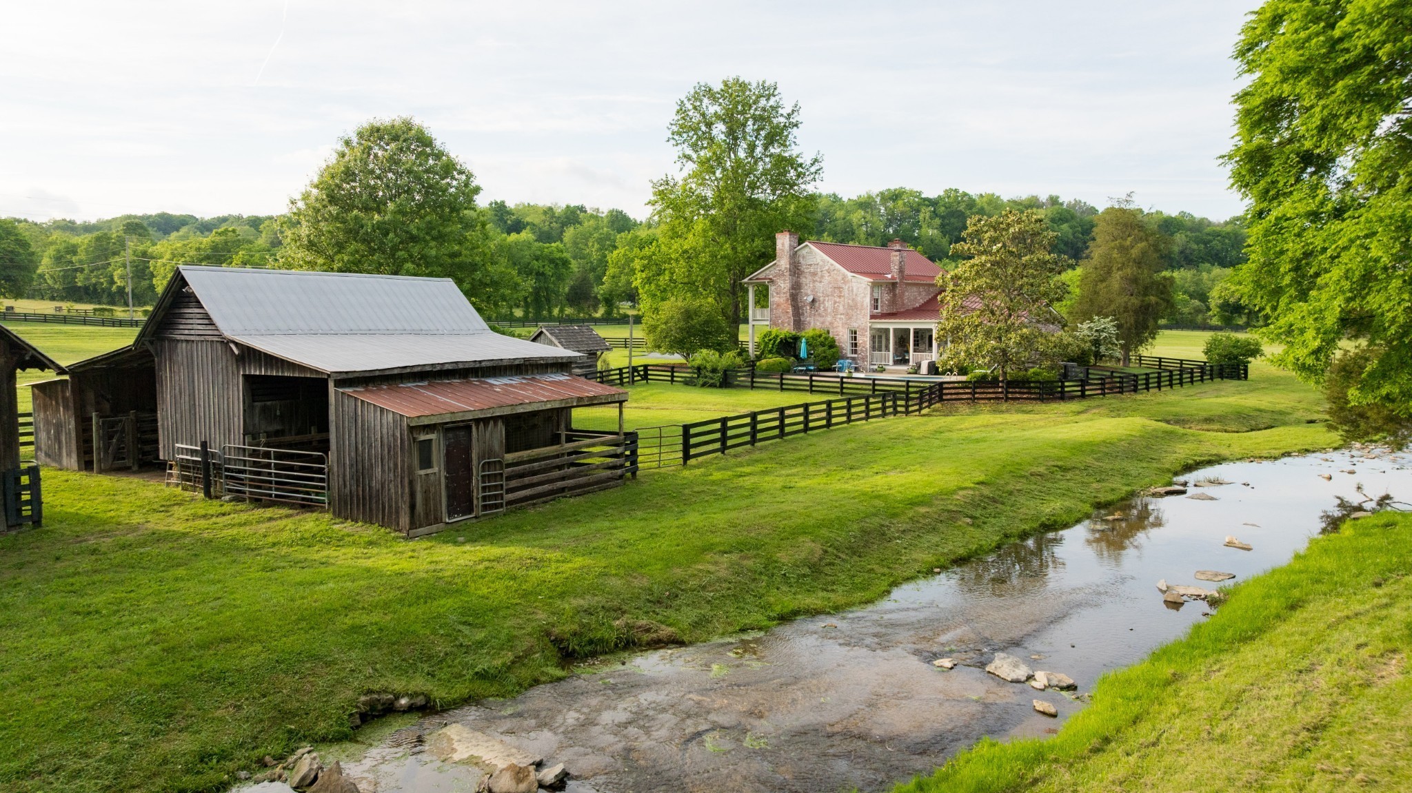 5620 Leipers Creek Road Franklin, TN 37064 - Photo 10 of 74 a view of a house with a yard and sitting area