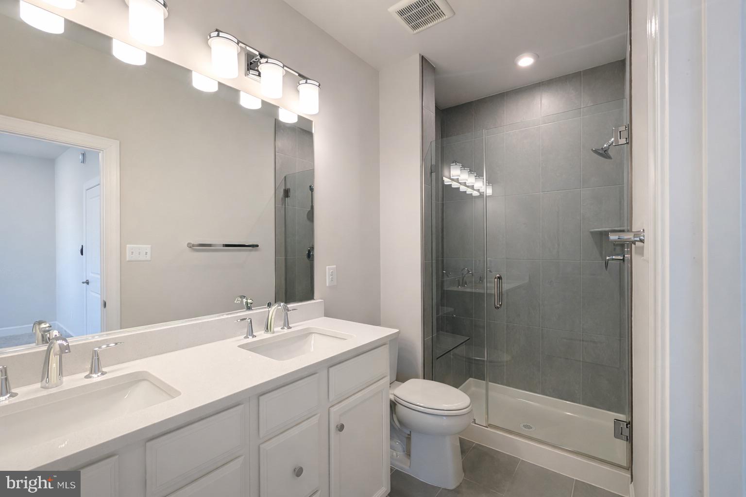 6710 Belcrest Road Hyattsville, MD 20782 - Photo 12 of 22 Owner's Ensuite offers a double vanity.