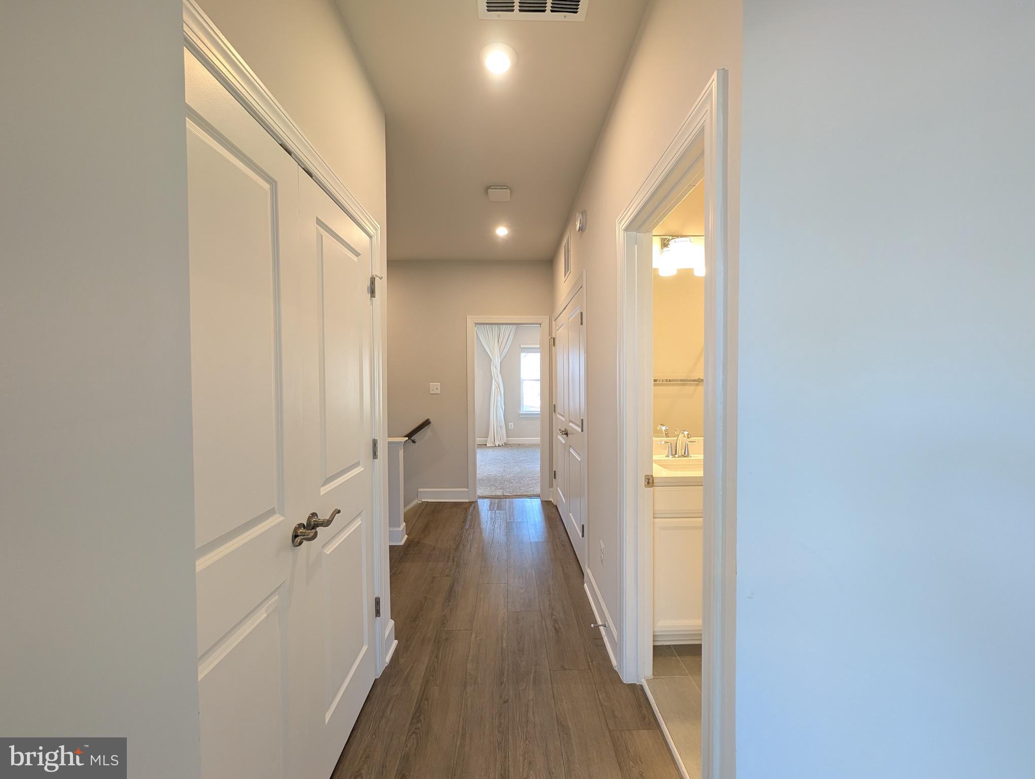 6710 Belcrest Road Hyattsville, MD 20782 - Photo 18 of 22 Well-lit, spacious hallway on the top floor.