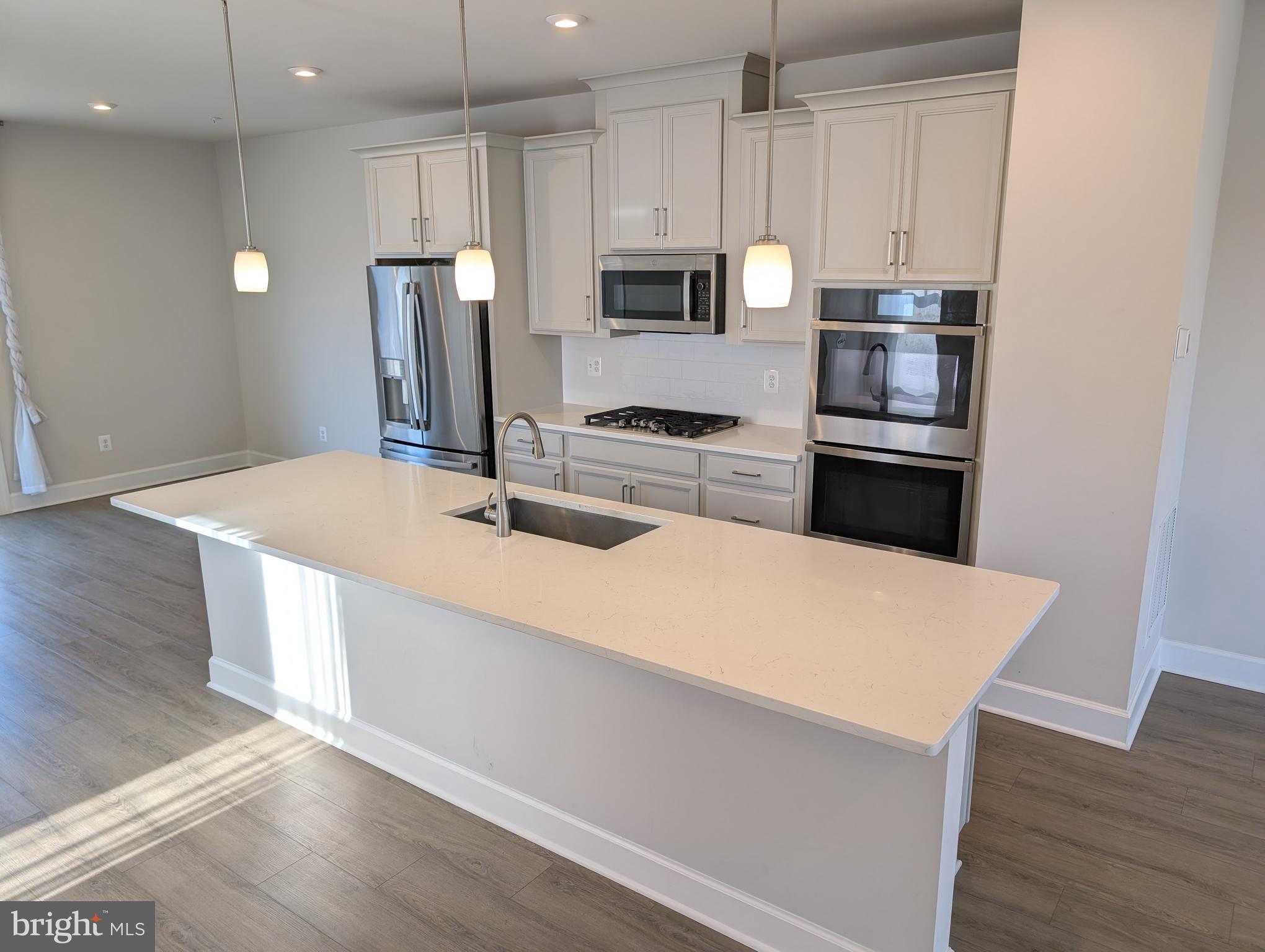 6710 Belcrest Road Hyattsville, MD 20782 - Photo 5 of 22 Gourmet kitchen shines with stainless steel.