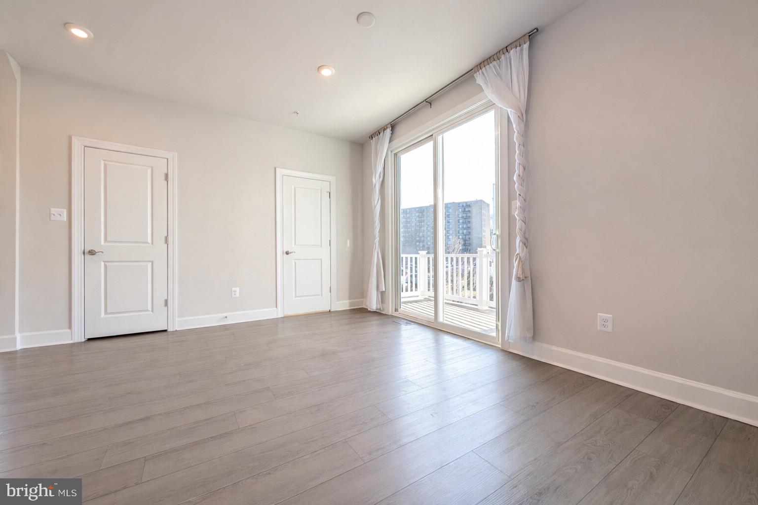 6710 Belcrest Road Hyattsville, MD 20782 - Photo 7 of 22 The dining-area flows to a private deck.