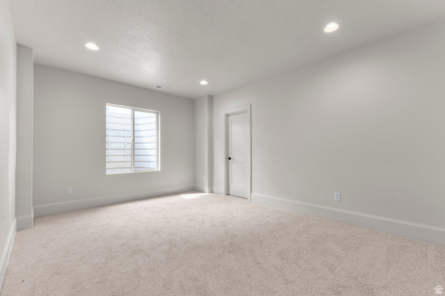 11718 South Halls Crk Road Draper, UT 84020 - Photo 28 of 28 Spacious room featuring light-colored carpeting and recessed ceiling lighting