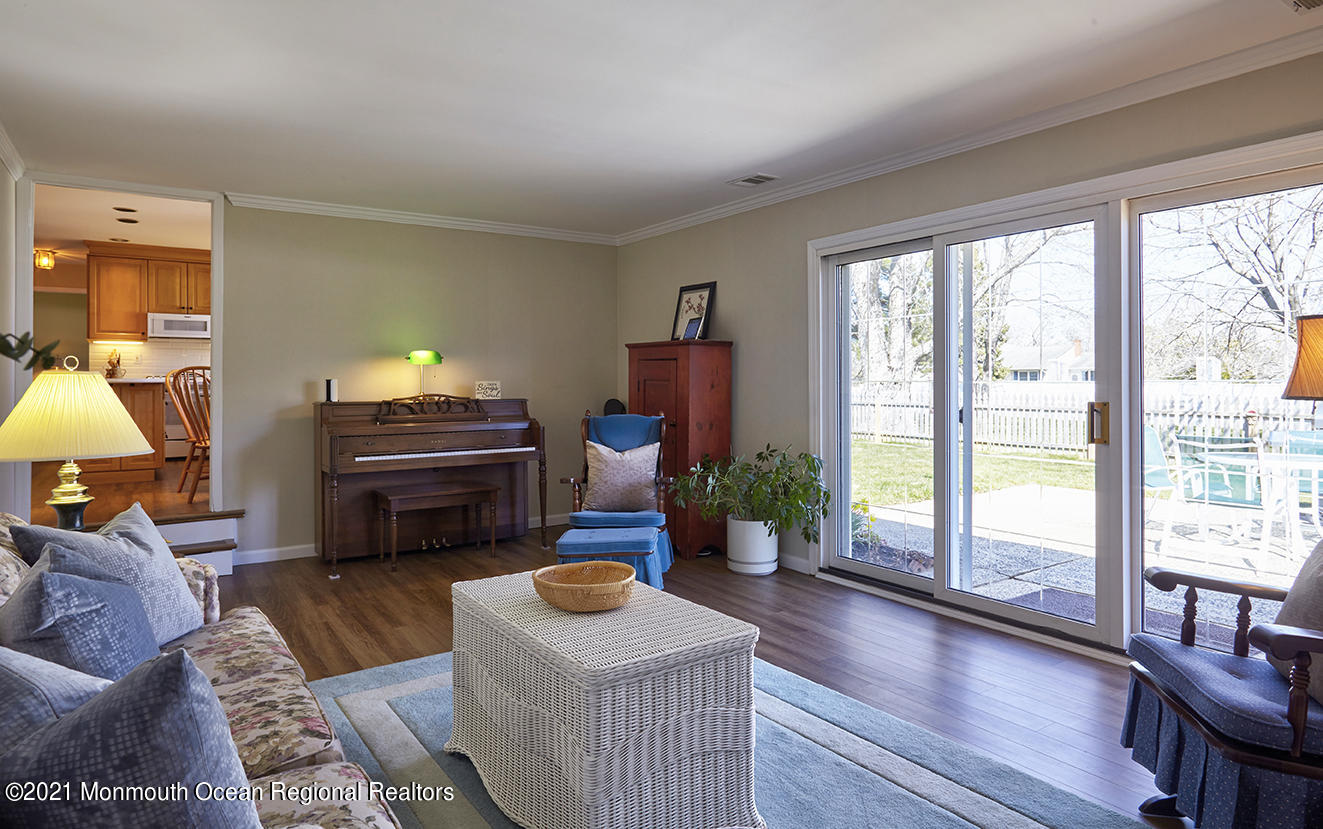 15 Homestead Road Freehold, NJ 07728 - Photo 14 of 54 a living room with furniture and a large window