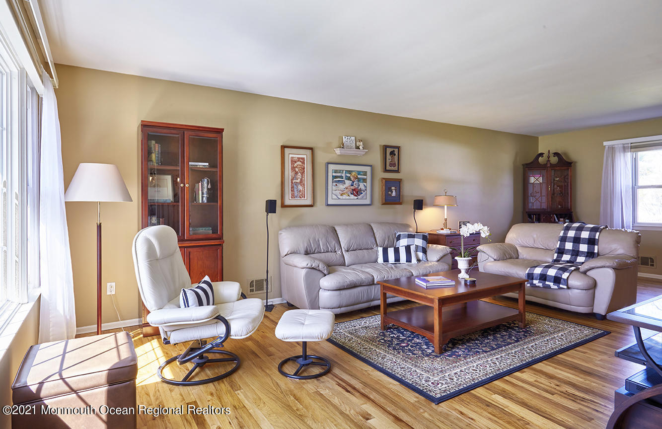 15 Homestead Road Freehold, NJ 07728 - Photo 3 of 54 a living room with furniture and wooden floor
