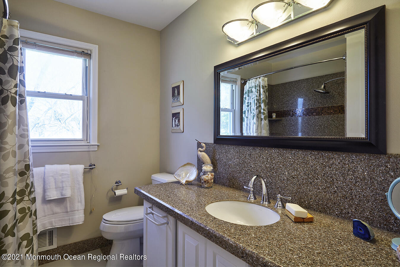 15 Homestead Road Freehold, NJ 07728 - Photo 22 of 54 a bathroom with a granite countertop toilet a sink and a mirror