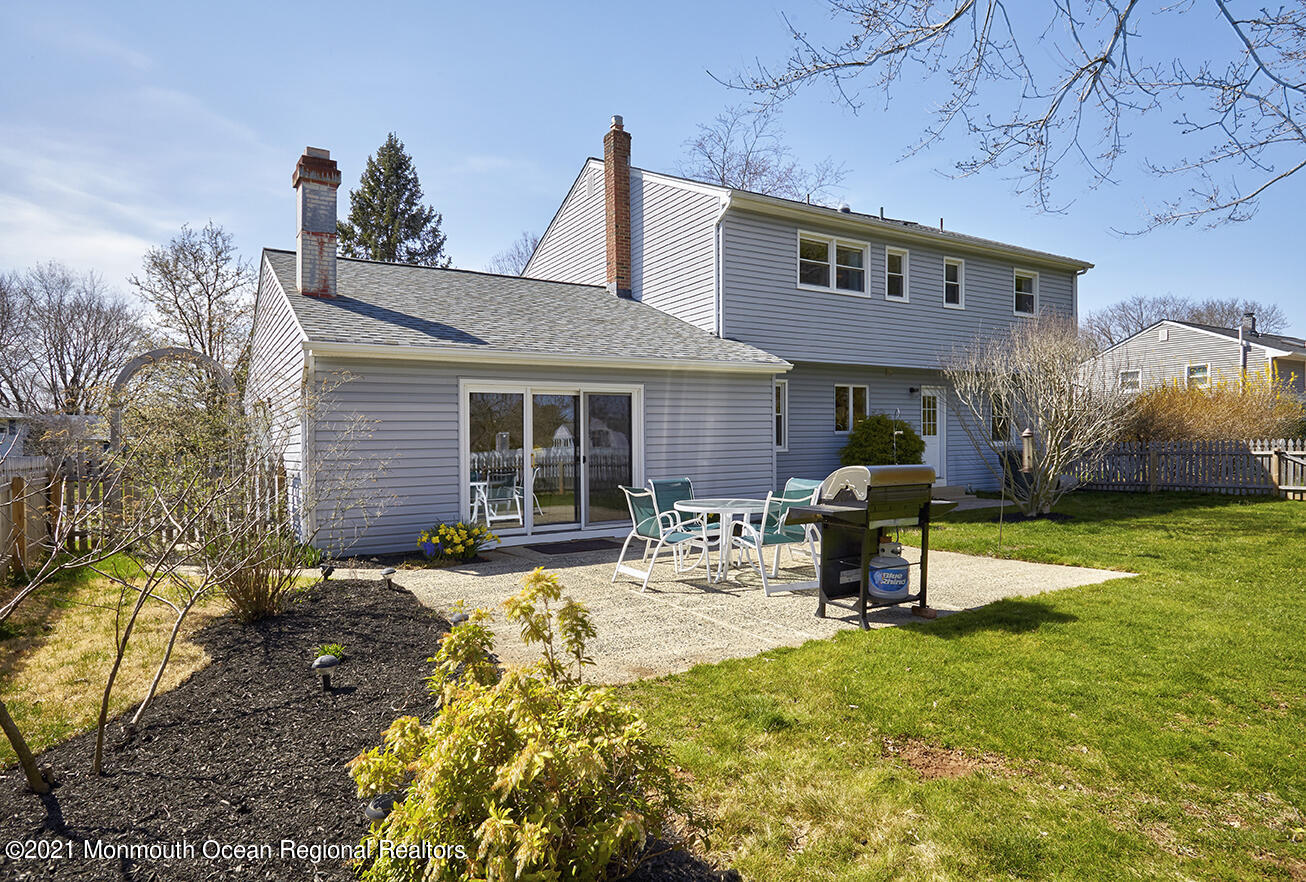 15 Homestead Road Freehold, NJ 07728 - Photo 40 of 54 a view of a house with backyard sitting area and garden
