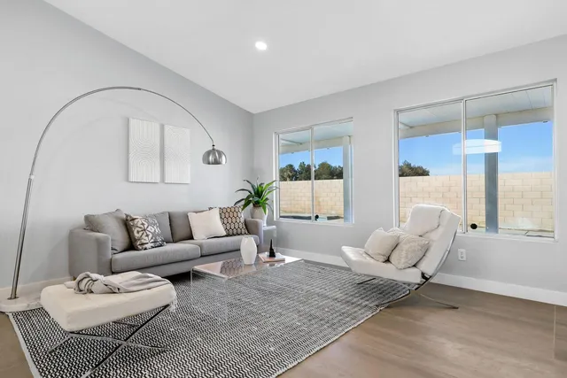 a living room with furniture and a couch