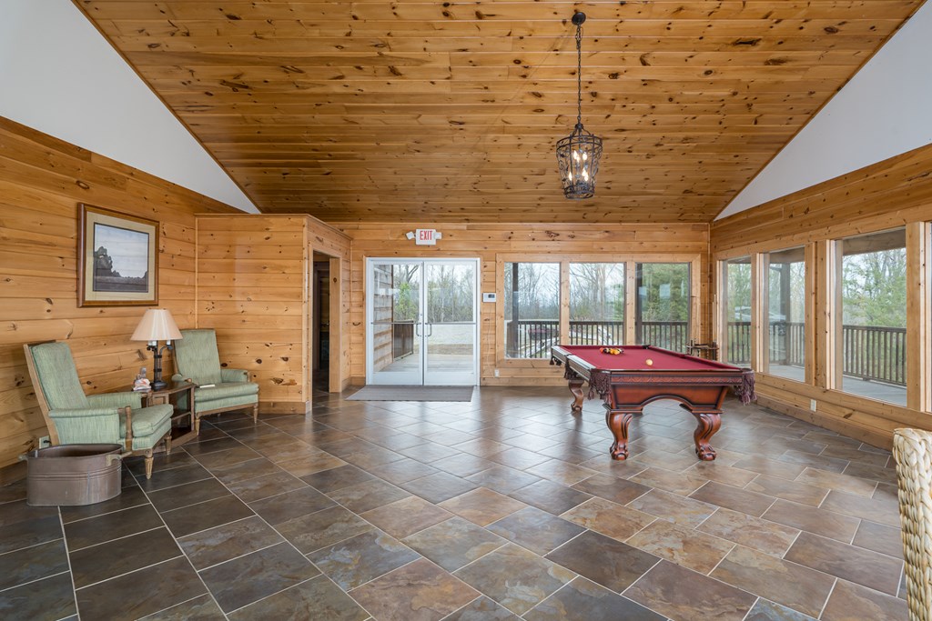 540 Plemons Road Chatsworth, GA 30705 - Photo 50 of 62 a swimming pool with outdoor seating