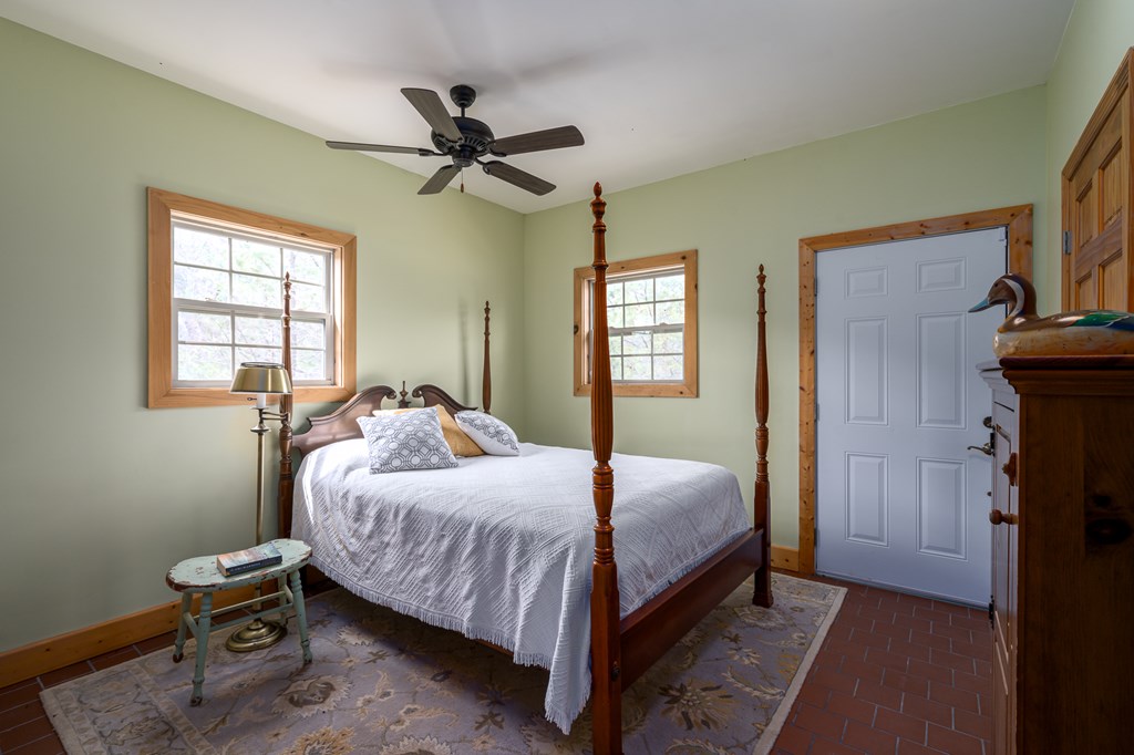 540 Plemons Road Chatsworth, GA 30705 - Photo 58 of 62 a bedroom with a bed and window