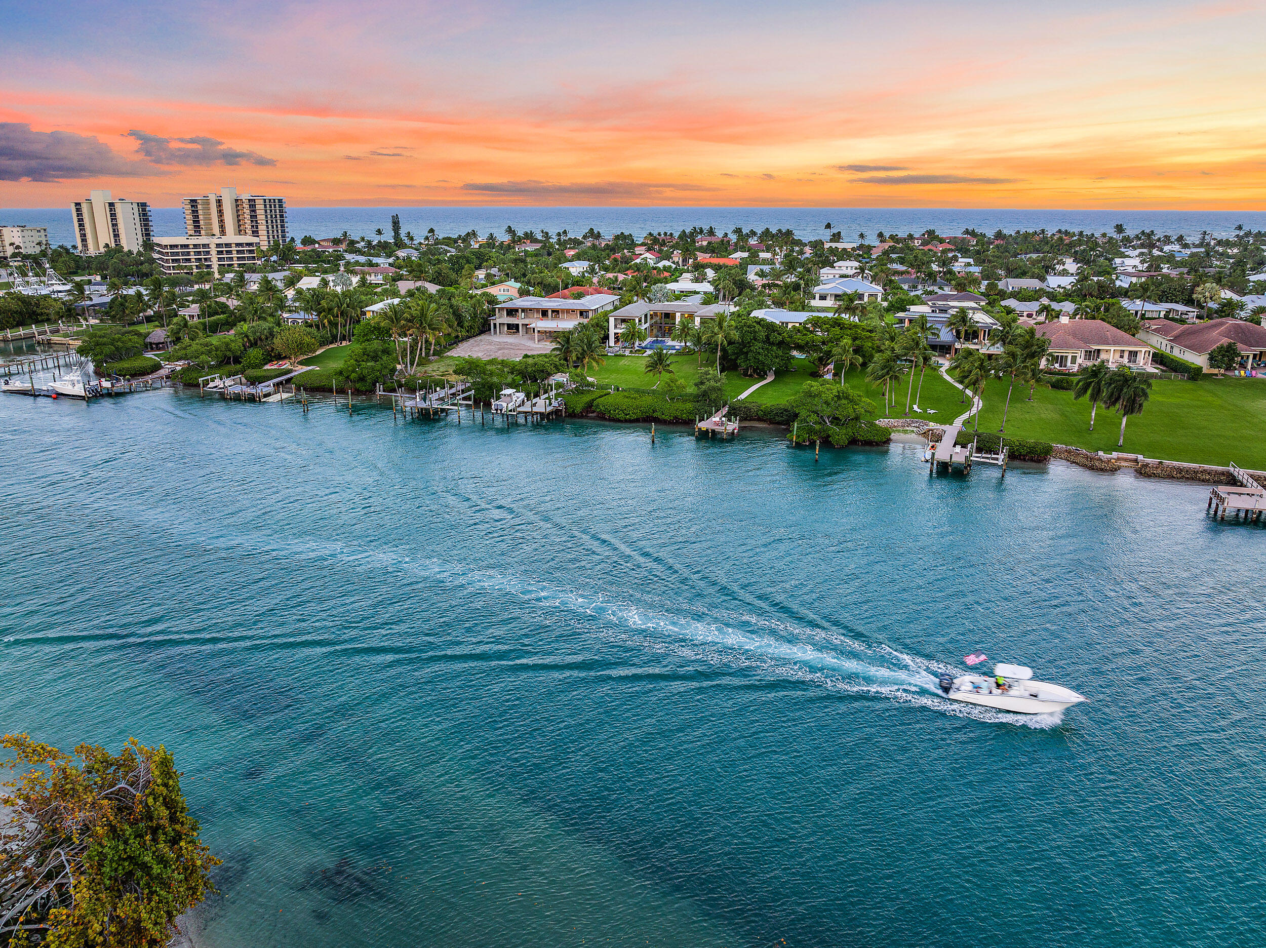 102 Lighthouse Drive Jupiter Inlet Colony, FL 33469 - Photo 11 of 18 a view of a lake with a city