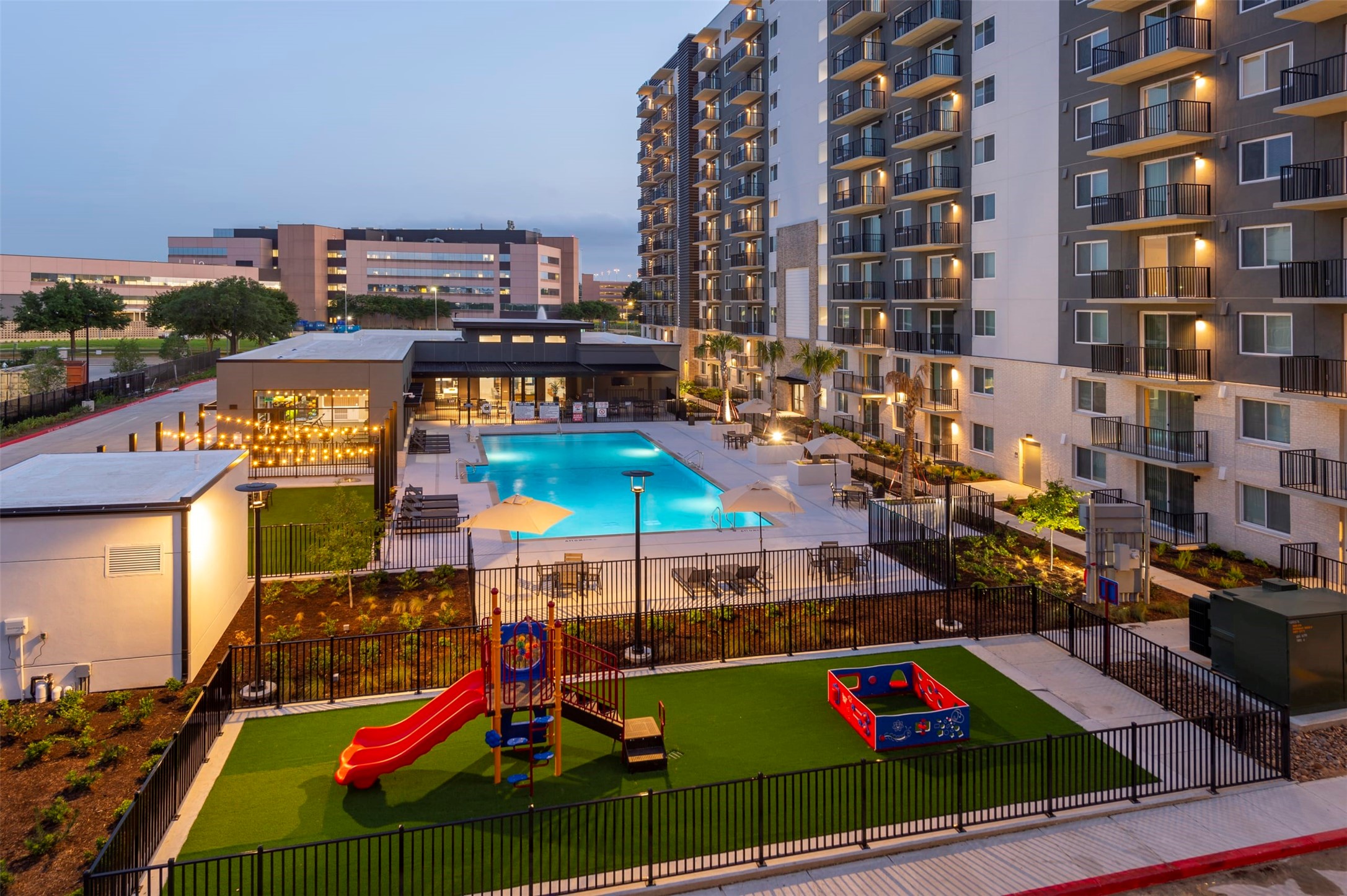 18036 Park Row Drive, Unit 3103 Houston, TX 77084 - Photo 9 of 20 a city street filled with lots of traffic and tall building