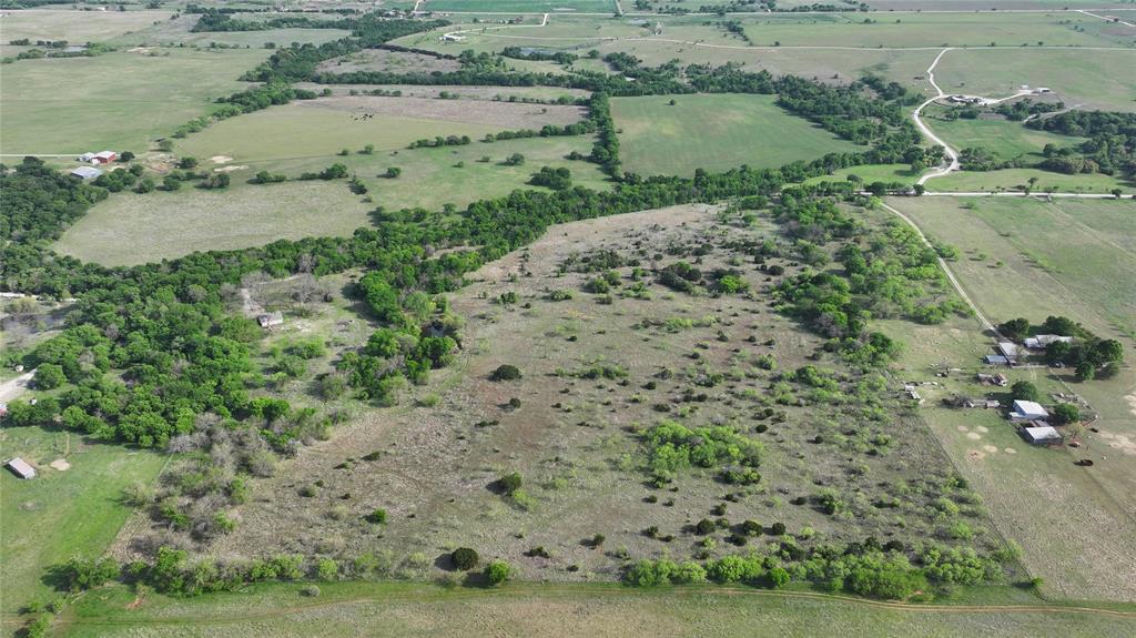 3 Hcr 1136 Rio Vista Rio Vista, TX 76093 - Photo 4 of 7 a view of a lake with a yard