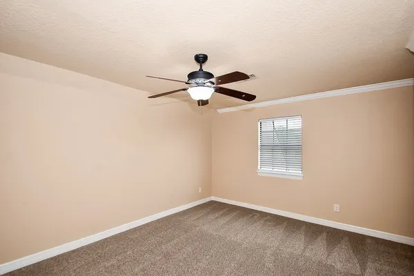 a view of a chandelier fan in a room