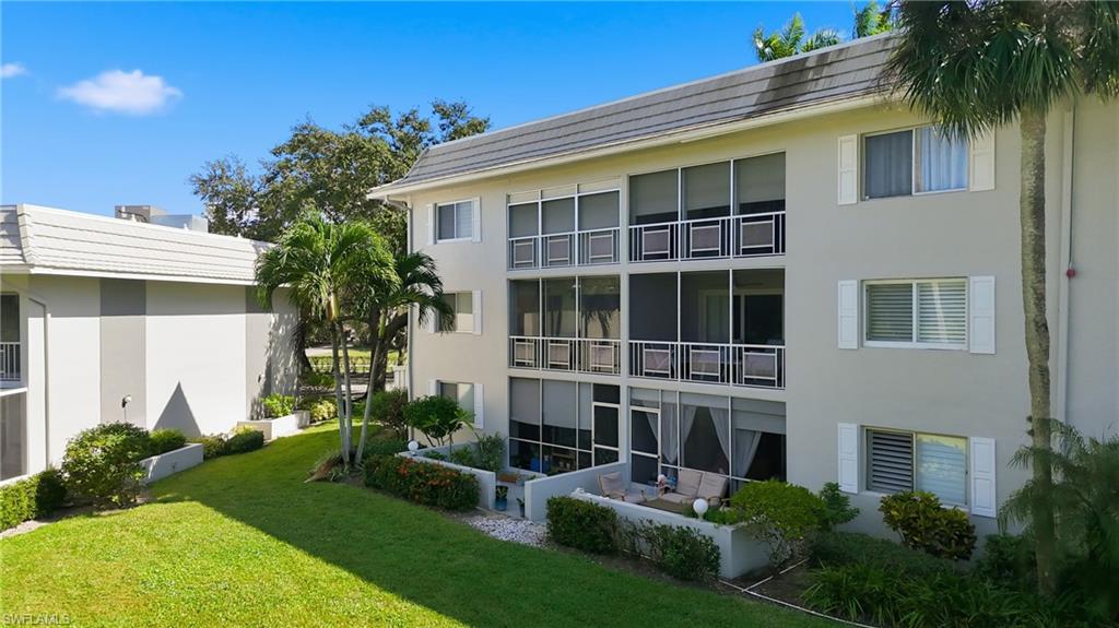 215 Cypress Way East, Unit D8 Naples, FL 34110 - Photo 16 of 20 View of property