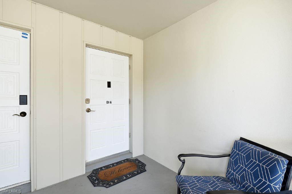 215 Cypress Way East, Unit D8 Naples, FL 34110 - Photo 2 of 20 Doorway to property