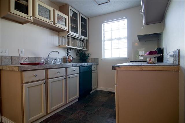108 River Bend Road Hendersonville, TN 37075 - Photo 6 of 20 Kitchen has unique cabinets with mesh & tin panels, and plate rack.