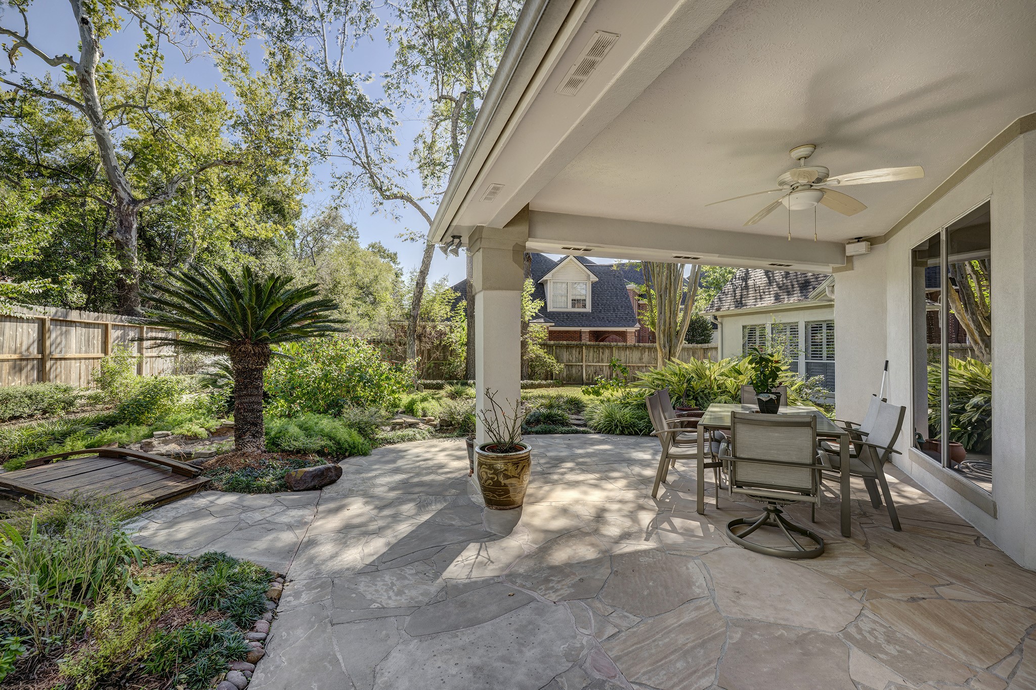 5302 Mahogany Creek Court Spring, TX 77379 - Photo 34 of 39 a building outdoor space with patio furniture and potted plants