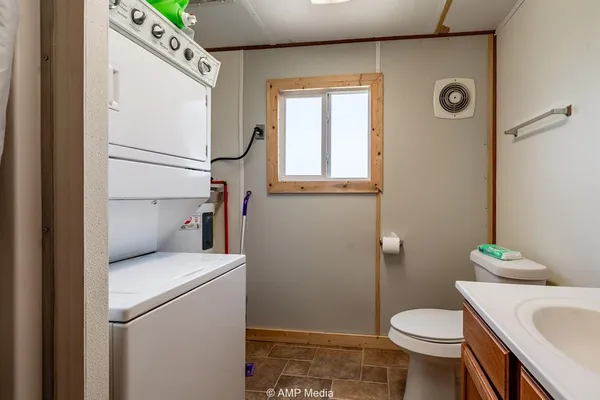 a bedroom with a bed and a closet