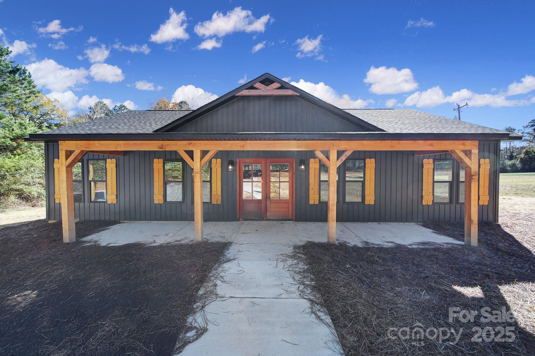 a house view with a garden space