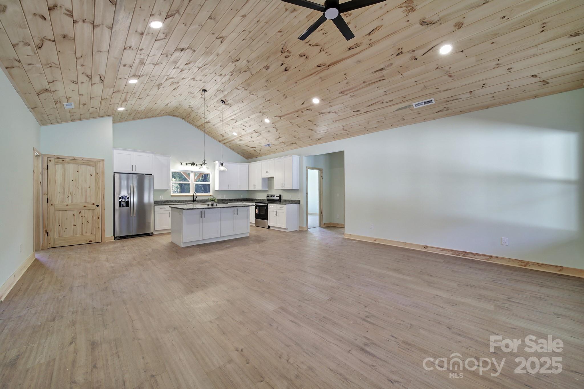 230 East Doc Garris Road Lancaster, SC 29720 - Photo 18 of 31 a view of a livingroom with a kitchen