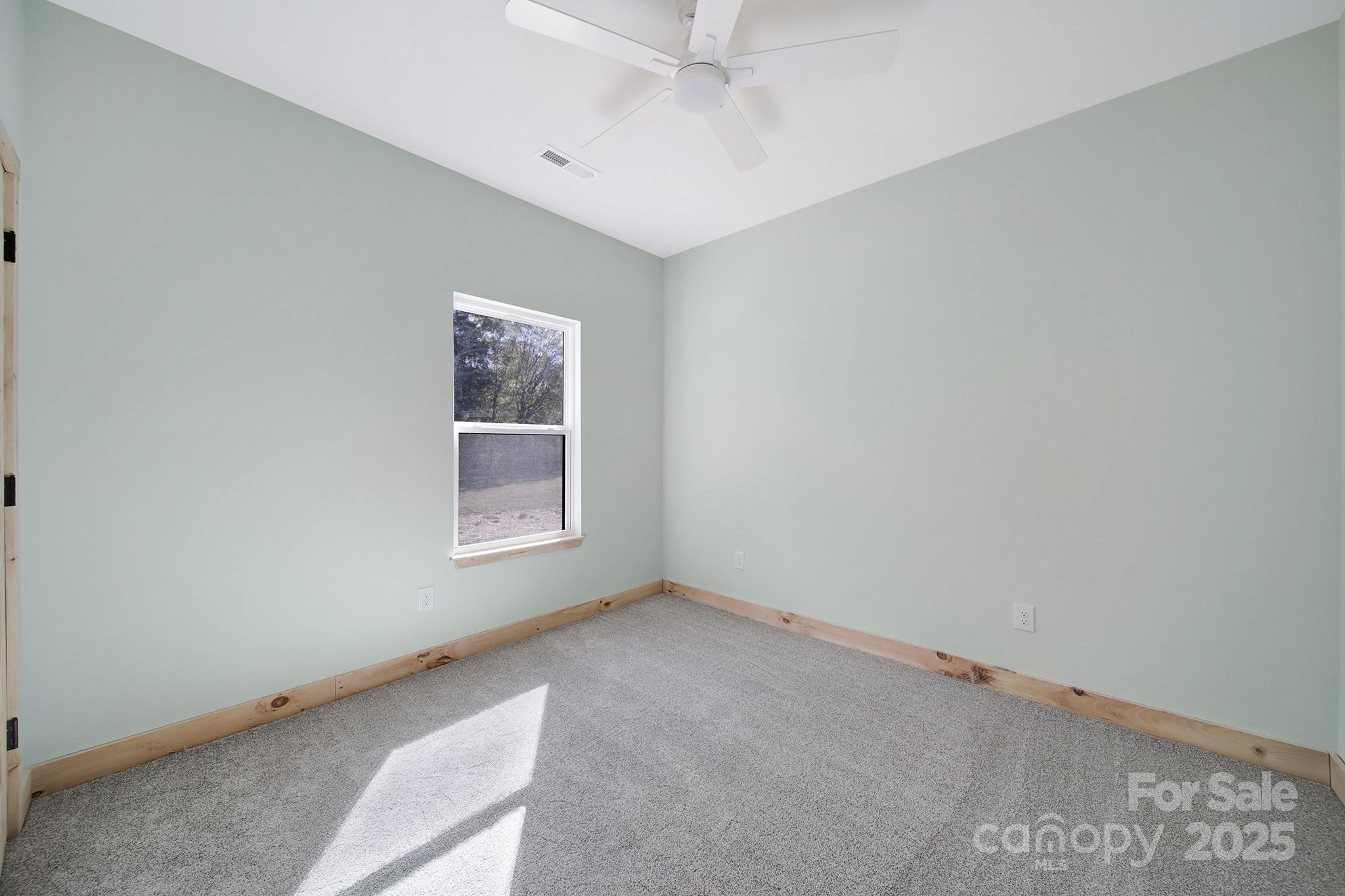 230 East Doc Garris Road Lancaster, SC 29720 - Photo 22 of 31 an empty room with a window