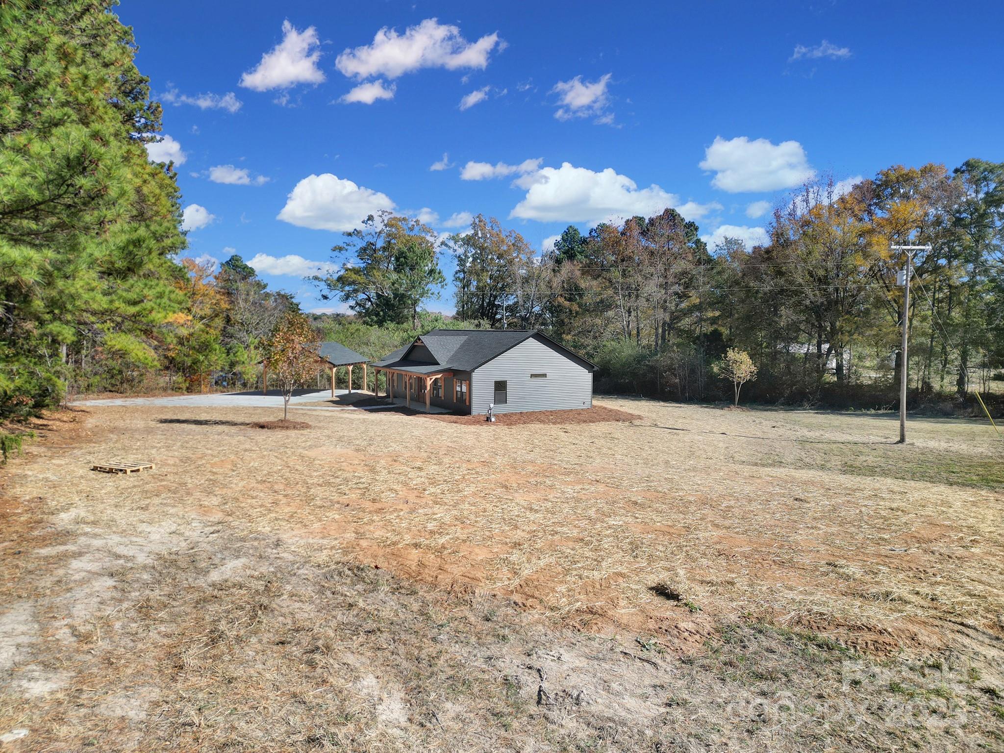230 East Doc Garris Road Lancaster, SC 29720 - Photo 5 of 31 a view of a green field