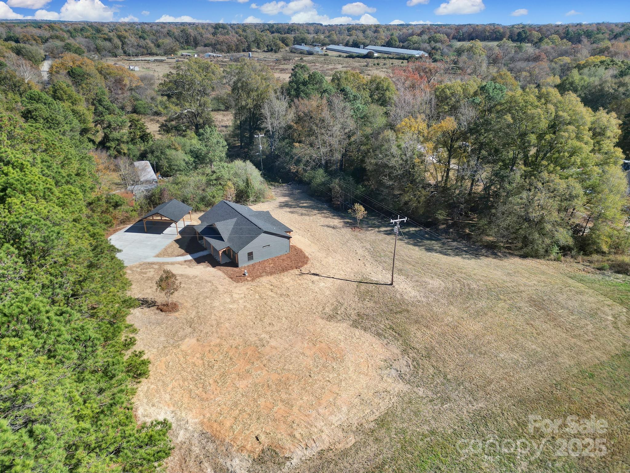 230 East Doc Garris Road Lancaster, SC 29720 - Photo 6 of 31 an aerial view of a house with a yard