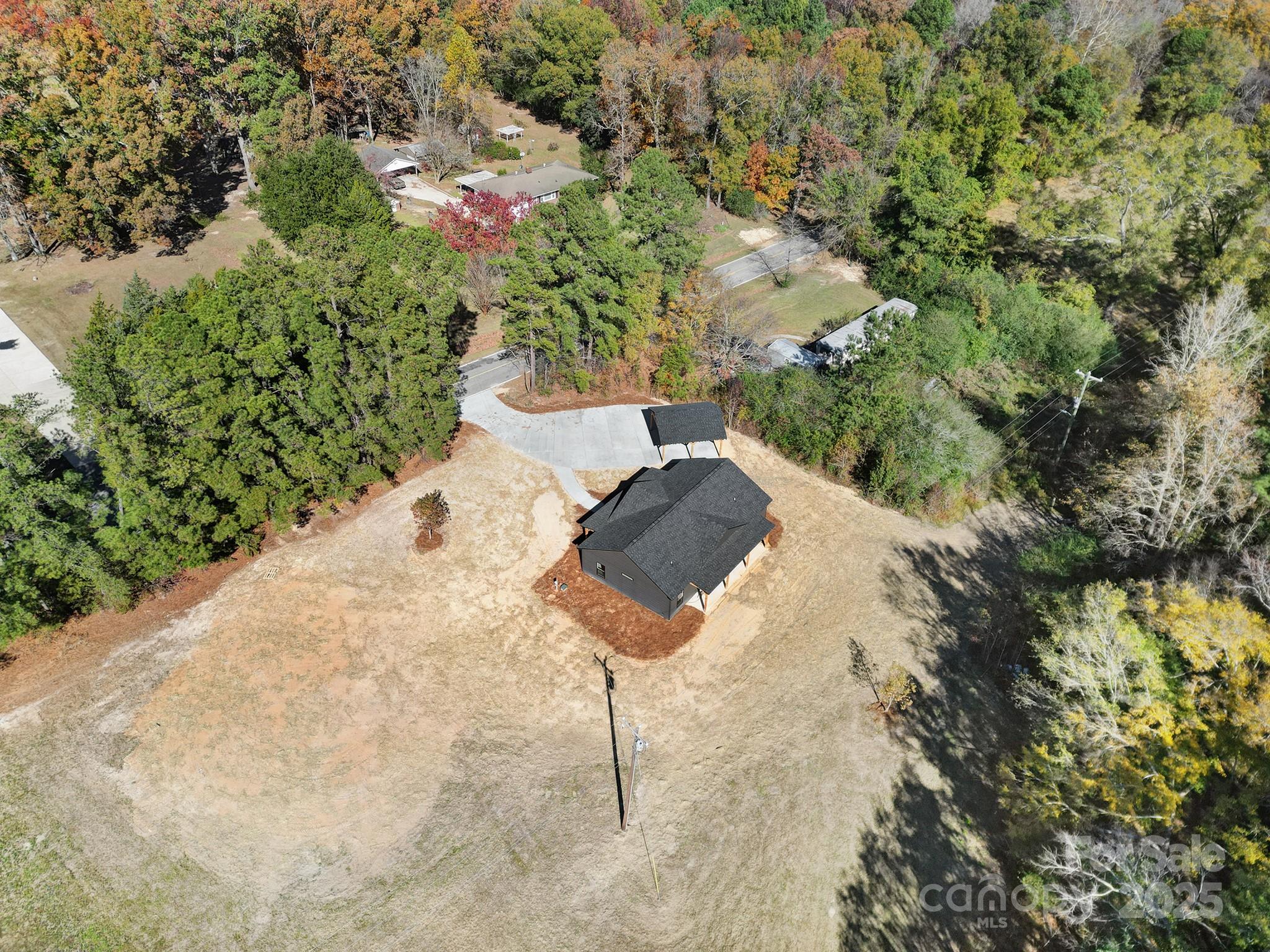 230 East Doc Garris Road Lancaster, SC 29720 - Photo 7 of 31 a view of a lake with a yard
