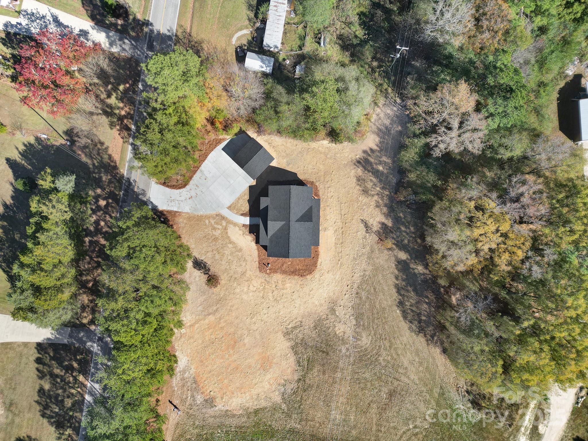 230 East Doc Garris Road Lancaster, SC 29720 - Photo 8 of 31 an aerial view of a house with a yard