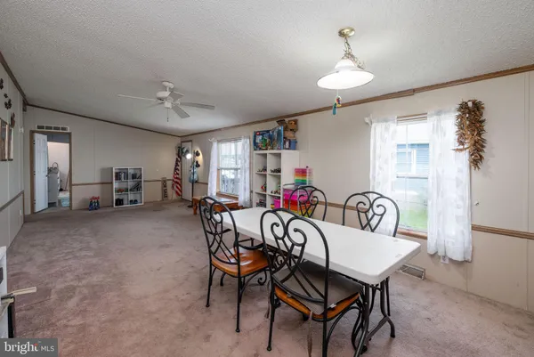 a view of a livingroom and dining room