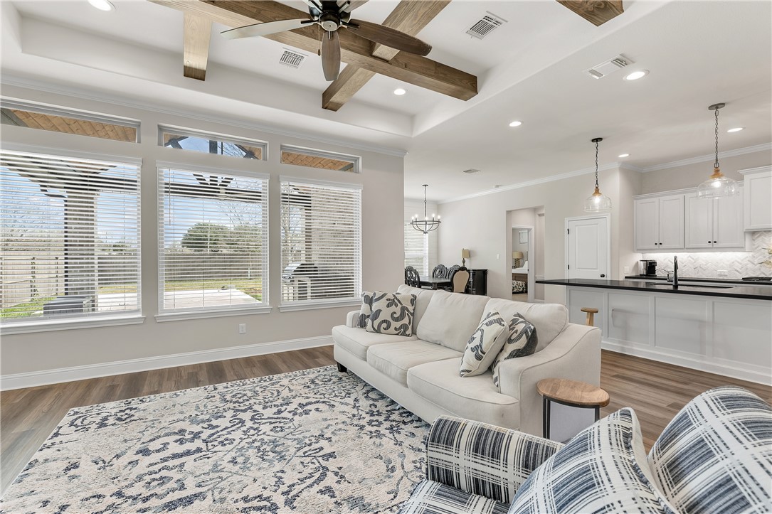 4355 Fox River Lane Bryan, TX 77802 - Photo 11 of 36 a living room with furniture and a large window