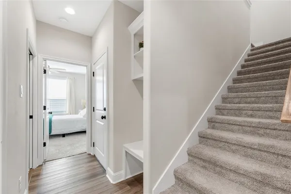 an empty room with a empty space and a ceiling fan