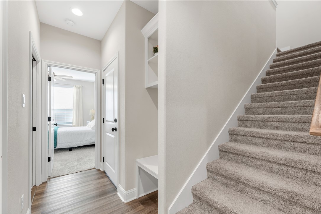 4355 Fox River Lane Bryan, TX 77802 - Photo 25 of 36 a view of an entryway with wooden floor and windows