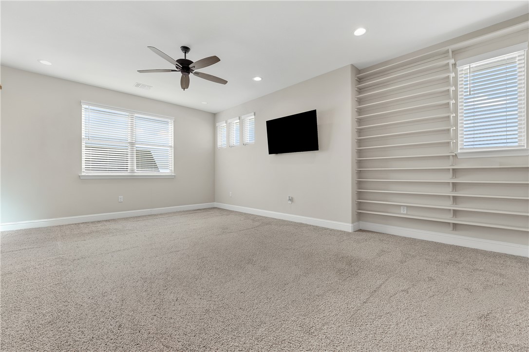4355 Fox River Lane Bryan, TX 77802 - Photo 27 of 36 a view of a livingroom with an empty space and a window