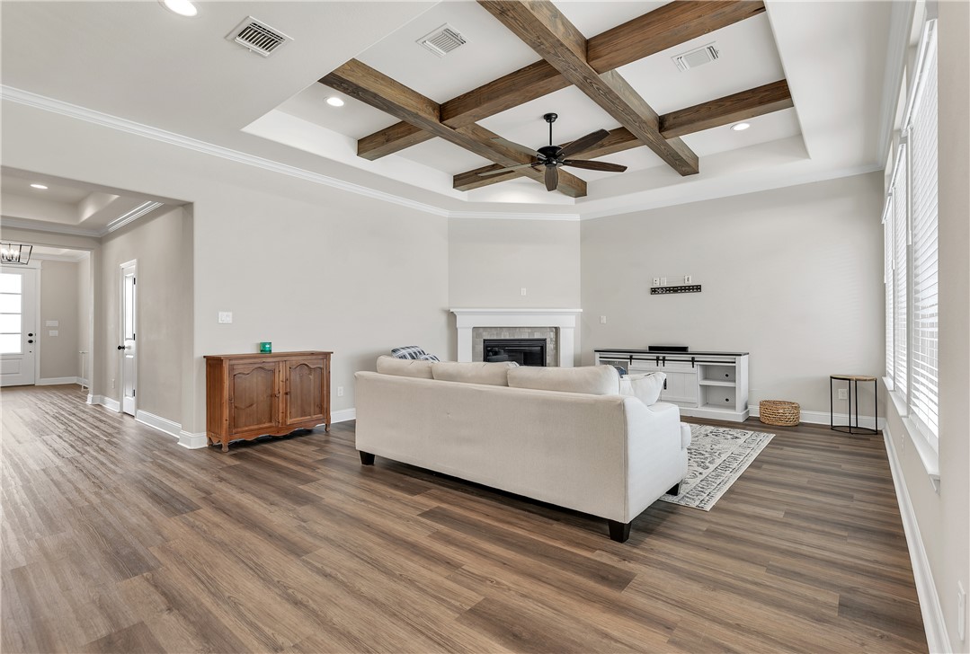 4355 Fox River Lane Bryan, TX 77802 - Photo 8 of 36 a living room with furniture and a wooden floor
