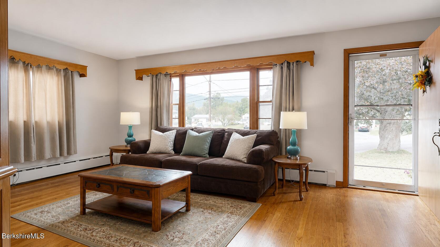16 Anthony Street Adams, MA 01220 - Photo 8 of 33 a living room with furniture and a window