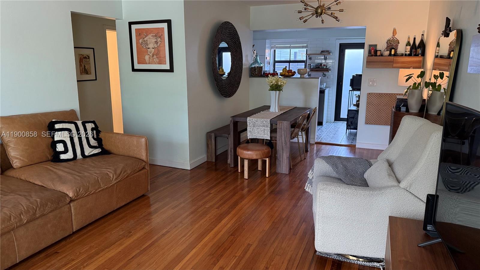 2 Northeast 44th Street Miami, FL 33137 - Photo 13 of 25 a living room with furniture and a wooden floor