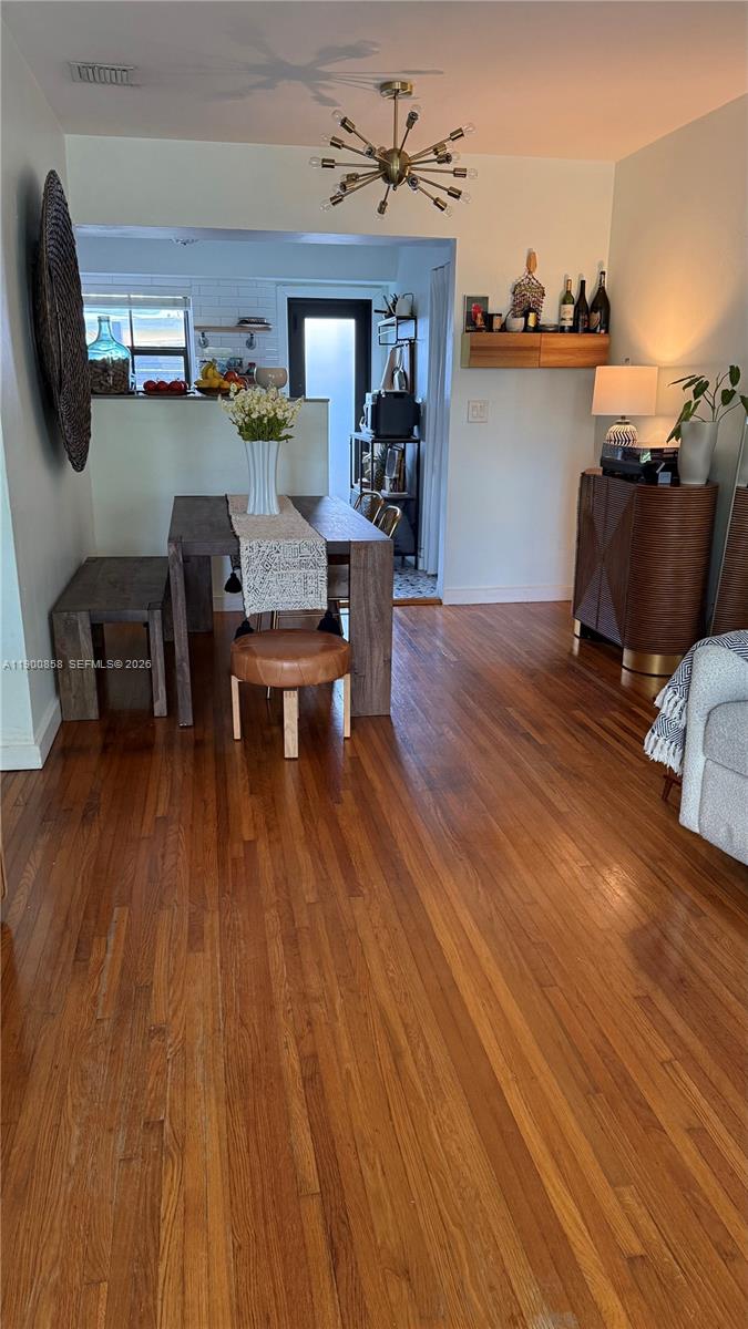 2 Northeast 44th Street Miami, FL 33137 - Photo 18 of 25 a living room with furniture and a wooden floor