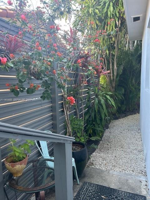 2 Northeast 44th Street Miami, FL 33137 - Photo 25 of 25 a view of backyard with seating space and trees
