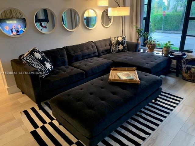 2 Northeast 44th Street Miami, FL 33137 - Photo 3 of 25 a living room with furniture and a rug