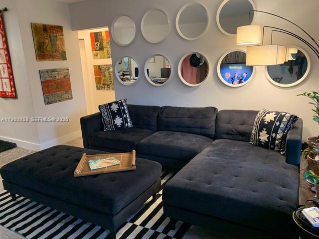 2 Northeast 44th Street Miami, FL 33137 - Photo 5 of 25 a living room with furniture and painting on the wall